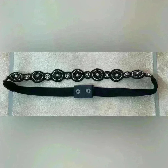Black women’s thin elastic belt with black/silver rhinestone circle design; 21” - Picture 1 of 2